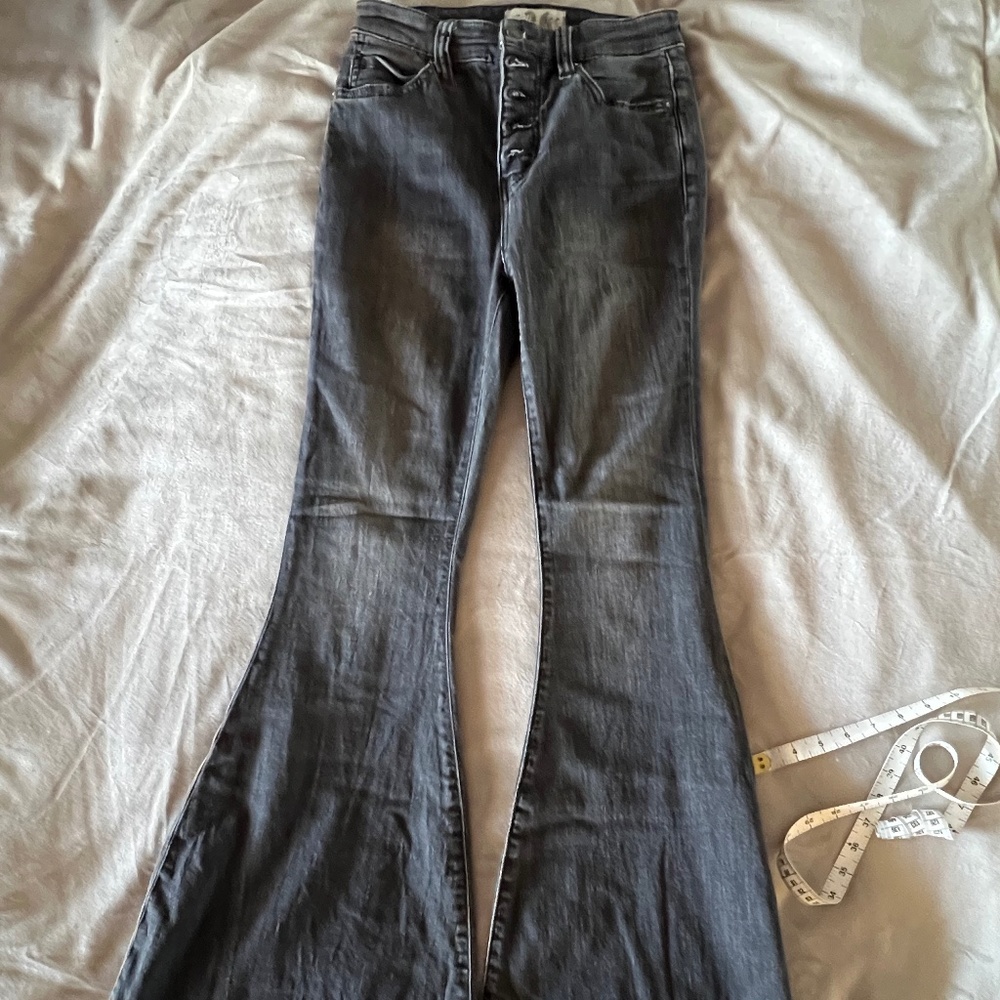 We the. Free black flare jeans